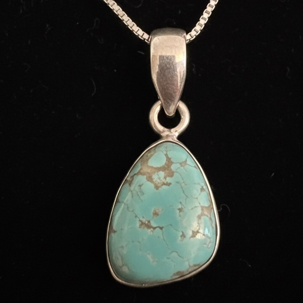 Genuine native American made turquoise and‎ sterling silver pendant